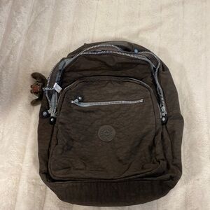 Brown Kipling laptop backpack. Brand new never used.